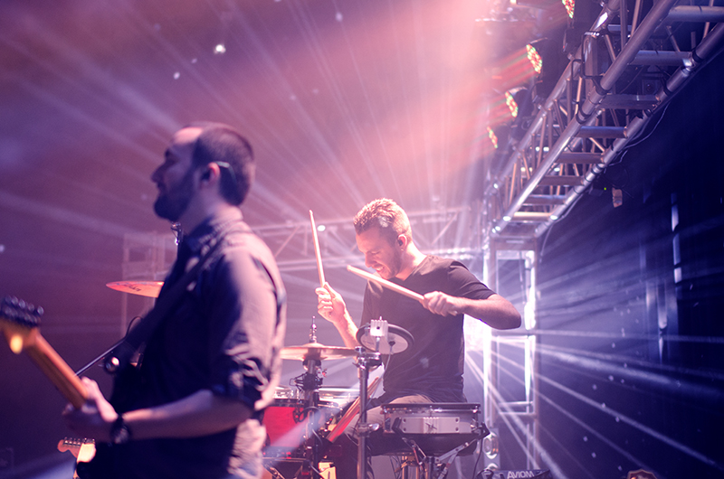 Drum kit set up on a live stage before a performance